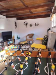 a living room with a table with legos on the floor at Casa Luzon, terraza-solarium con ducha y salon rustico in Villarejo de Salvanés