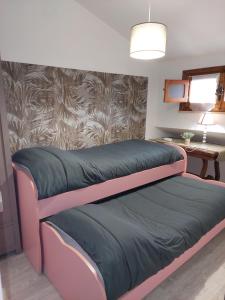 Postel nebo postele na pokoji v ubytování Sopra le nuvole