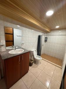 a bathroom with a sink and a toilet at Blasina el valle in Valle de Anton +56 photos