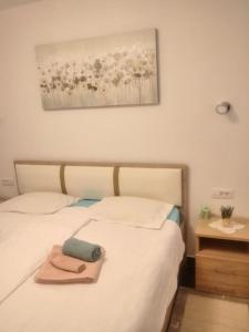 Postel nebo postele na pokoji v ubytování Green Oasis Pula