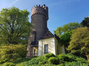 a house with a tower on top of it at VILLA LANZO Linz in Linz
