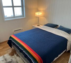 Un pat sau paturi într-o cameră la Voss Resort - 2br vacation apartment