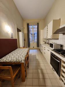 Kuchyň nebo kuchyňský kout v ubytování TATA Homes B&B