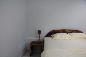 Katil atau katil-katil dalam bilik di Mesari Cottage Guest House