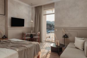 Letto o letti in una camera di Luxury Suites by Lato