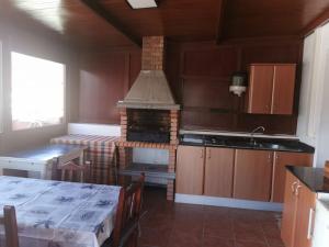 Kuchyň nebo kuchyňský kout v ubytování Terraza de Veneguera