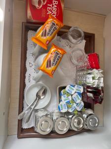 a drawer with food and utensils in a refrigerator at Bru Na Pairc B&B in Bantry