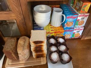 a tray of bread and pastries on a table at Bru Na Pairc B&B in Bantry