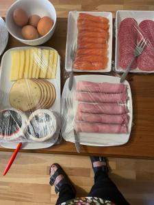 a table topped with trays of different types of food at Bru Na Pairc B&B in Bantry