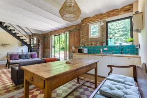 Posezení v ubytování La maison du palefrenier