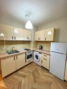 Η κουζίνα ή μικρή κουζίνα στο Azurro Residence