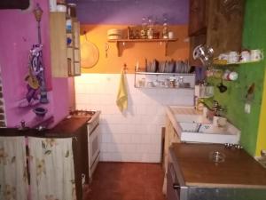 a small kitchen with a sink and a counter at Residence "Ana Pletvarska" in Prilep
