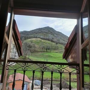 a view from a window of a mountain at Pensión Casa Morán in Benia de Onís