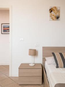 En eller flere senge i et værelse på “Sui tetti di Pietra” Appartamento Centro Storico + 23 billeder