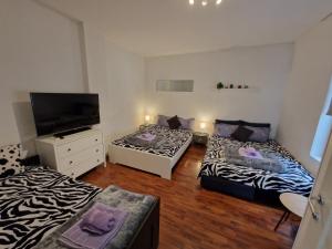 Ένα ή περισσότερα κρεβάτια σε δωμάτιο στο Belgrade Downtown Homestay