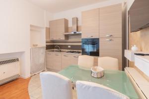 Kuchyň nebo kuchyňský kout v ubytování La CORTE di GIO' 2 + 11 fotografií