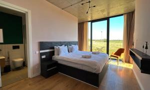 Postel nebo postele na pokoji v ubytování Villa N40