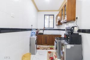 Kuchyň nebo kuchyňský kout v ubytování Stylish Classy Home Bamburi + 25 fotografií