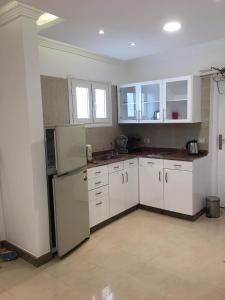 Kuchyň nebo kuchyňský kout v ubytování Energetic & Fun Apartments