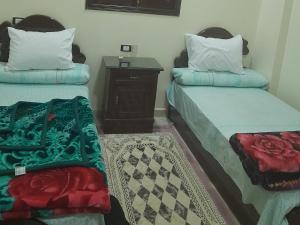 Een bed of bedden in een kamer bij Isis house