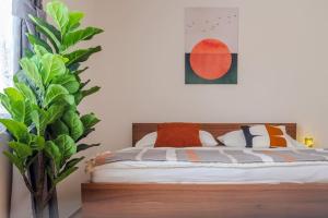 Postel nebo postele na pokoji v ubytování L'Mai Riverside Residence Prague + 17 fotografií