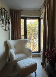 Posezení v ubytování Apartman Aspen Divcibare