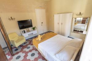 Postel nebo postele na pokoji v ubytování Tinja Bnb