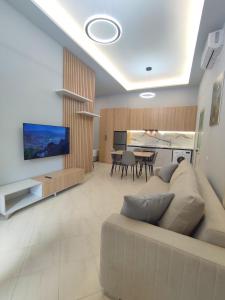 TV a/nebo společenská místnost v ubytování BP Beach Apartments
