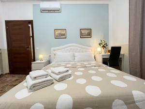 Postel nebo postele na pokoji v ubytování B&B Prime Sant'Agostino