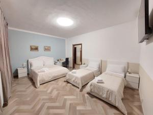 Postel nebo postele na pokoji v ubytování B&B Prime Sant'Agostino