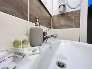 Koupelna v ubytování B&B Prime Sant'Agostino + 15 fotografií