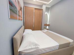 Postel nebo postele na pokoji v ubytování BP Beach Apartments