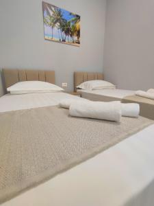 Postel nebo postele na pokoji v ubytování BP Beach Apartments