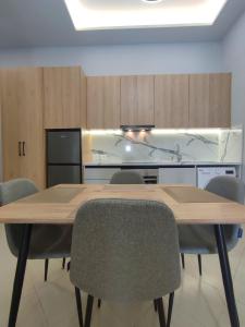 Kuchyň nebo kuchyňský kout v ubytování BP Beach Apartments