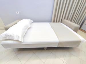 Postel nebo postele na pokoji v ubytování BP Beach Apartments