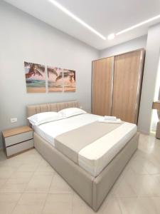 Postel nebo postele na pokoji v ubytování BP Beach Apartments
