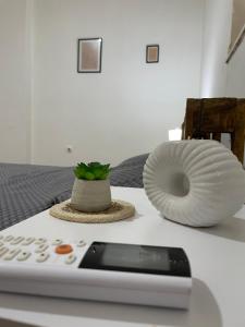 เตียงในห้องที่ Fenix Apartman II