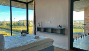 Postel nebo postele na pokoji v ubytování Villa N40