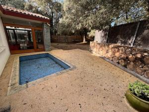 a large swimming pool in the middle of a yard at Maison bord de mer proche des Sables d'Olonne in Talmont