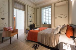 Postel nebo postele na pokoji v ubytování Serenata Hotel & Hostel Coimbra