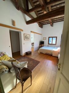 Katil atau katil-katil dalam bilik di Agriturismo Barchessa
