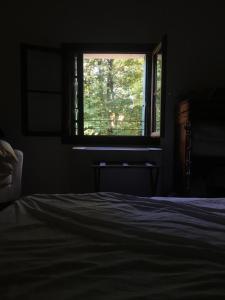Katil atau katil-katil dalam bilik di Agriturismo Barchessa