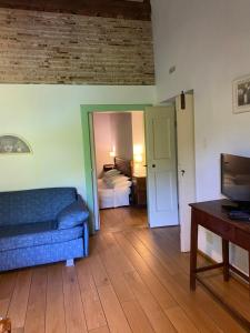 Katil atau katil-katil dalam bilik di Agriturismo Barchessa