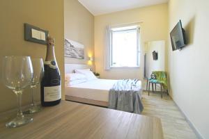 TV a/nebo společenská místnost v ubytování Capo d'Orlando Apartments - Smart Apartment Doria 52
