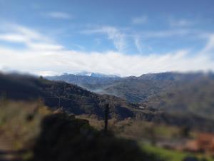 a view of a valley with mountains in the distance at La Casina de Asturias in Mieres +42 photos