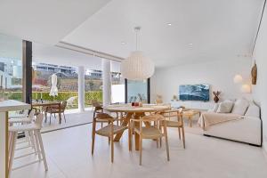 Posezení v ubytování Beautiful Deluxe Garden Apartment