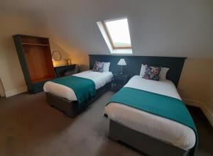 Postelja oz. postelje v sobi nastanitve Cliffs View Self Catering @ Limestone Lodge