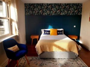Ein Bett oder Betten in einem Zimmer der Unterkunft Limestone Lodge Apartment