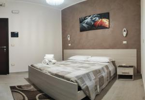 Postel nebo postele na pokoji v ubytování Guest House Elettra