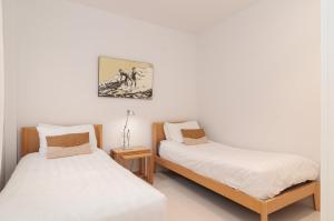 Posteľ alebo postele v izbe v ubytovaní Luxurious Apartment In Terrazas Del Duque + 15 fotografií